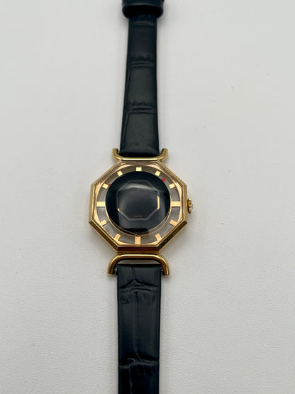 Main front view of Juvenia Octagion Vintage Women's Watch in gold case with black strap
