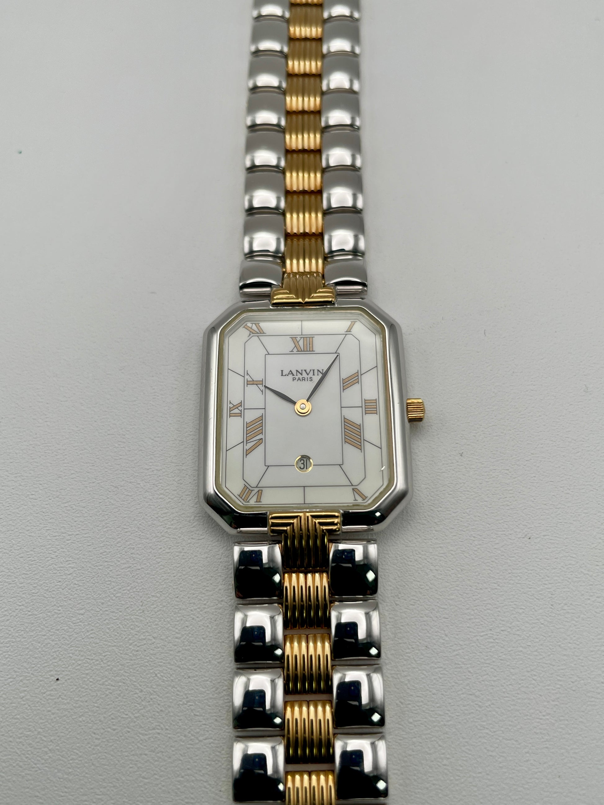 Close-up front view of Lanvin Paris 516897.B watch featuring octagonal white dial and Roman numerals
