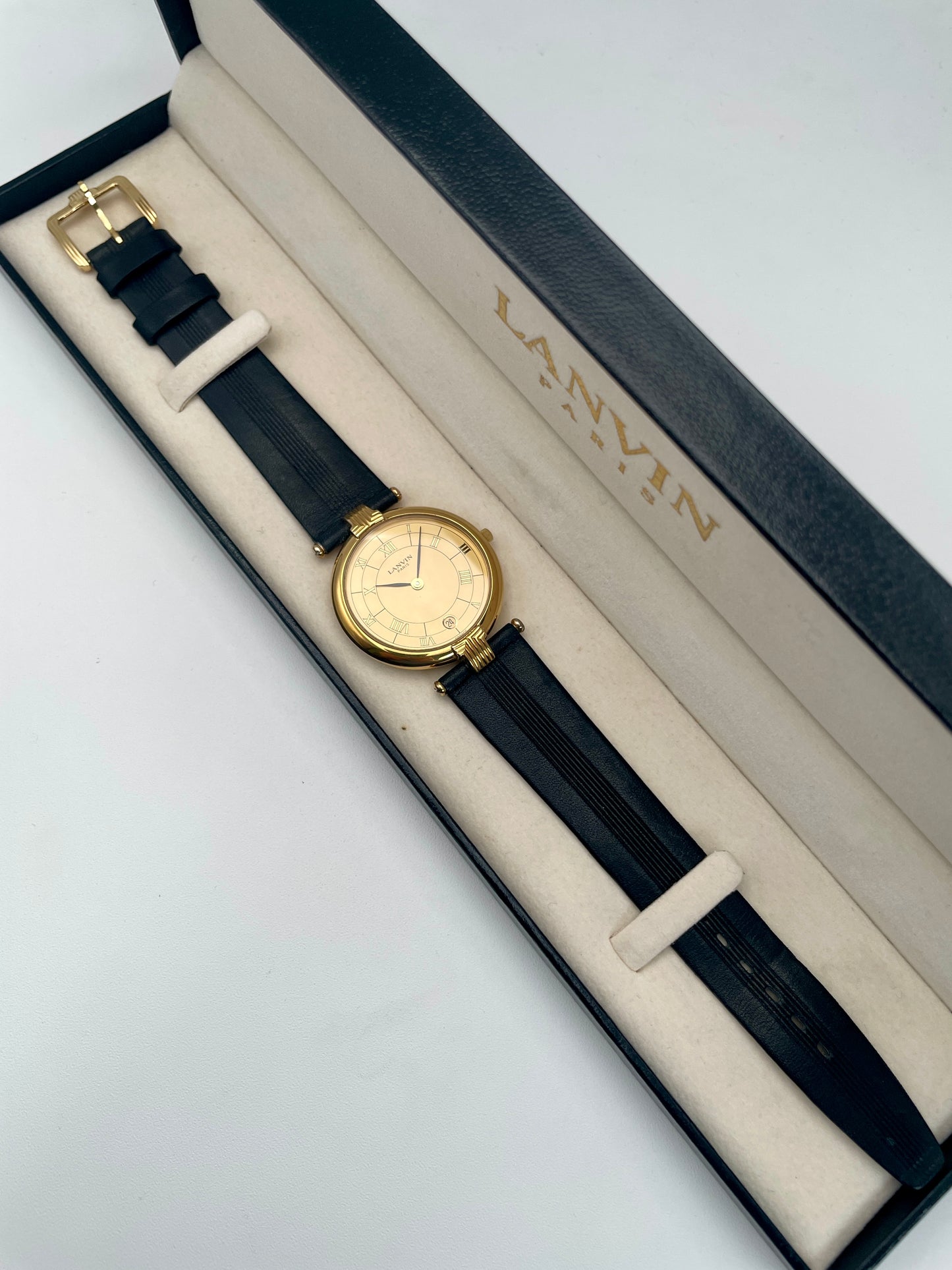 Lanvin Paris Vintage Ladies Watch in gold-tone case with black leather strap, main view in box