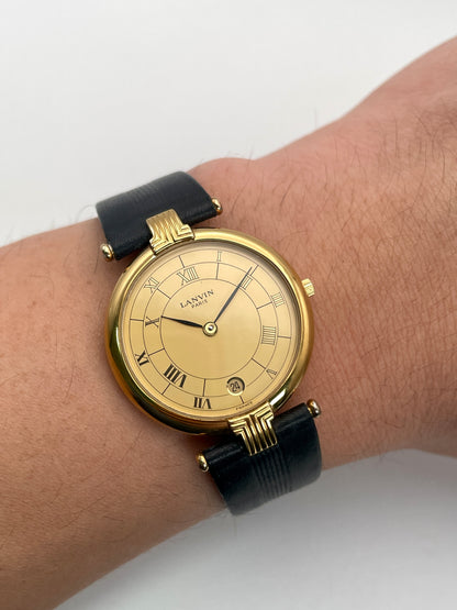 Lanvin Paris Vintage Watch in gold case worn on wrist, showcasing the classic design
