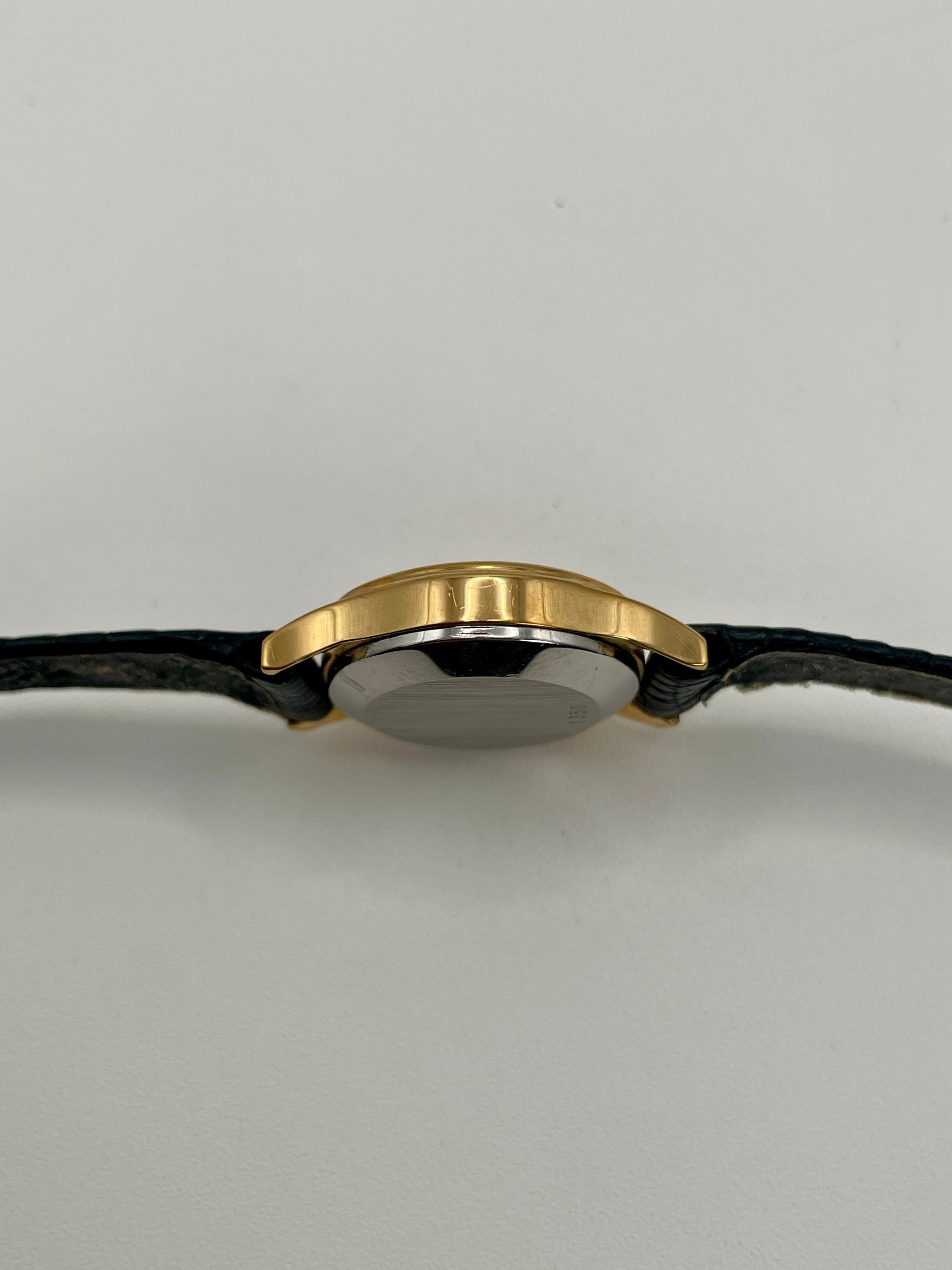 Profile side view of the Omega De Ville 1350 highlighting its ultra-slim case.