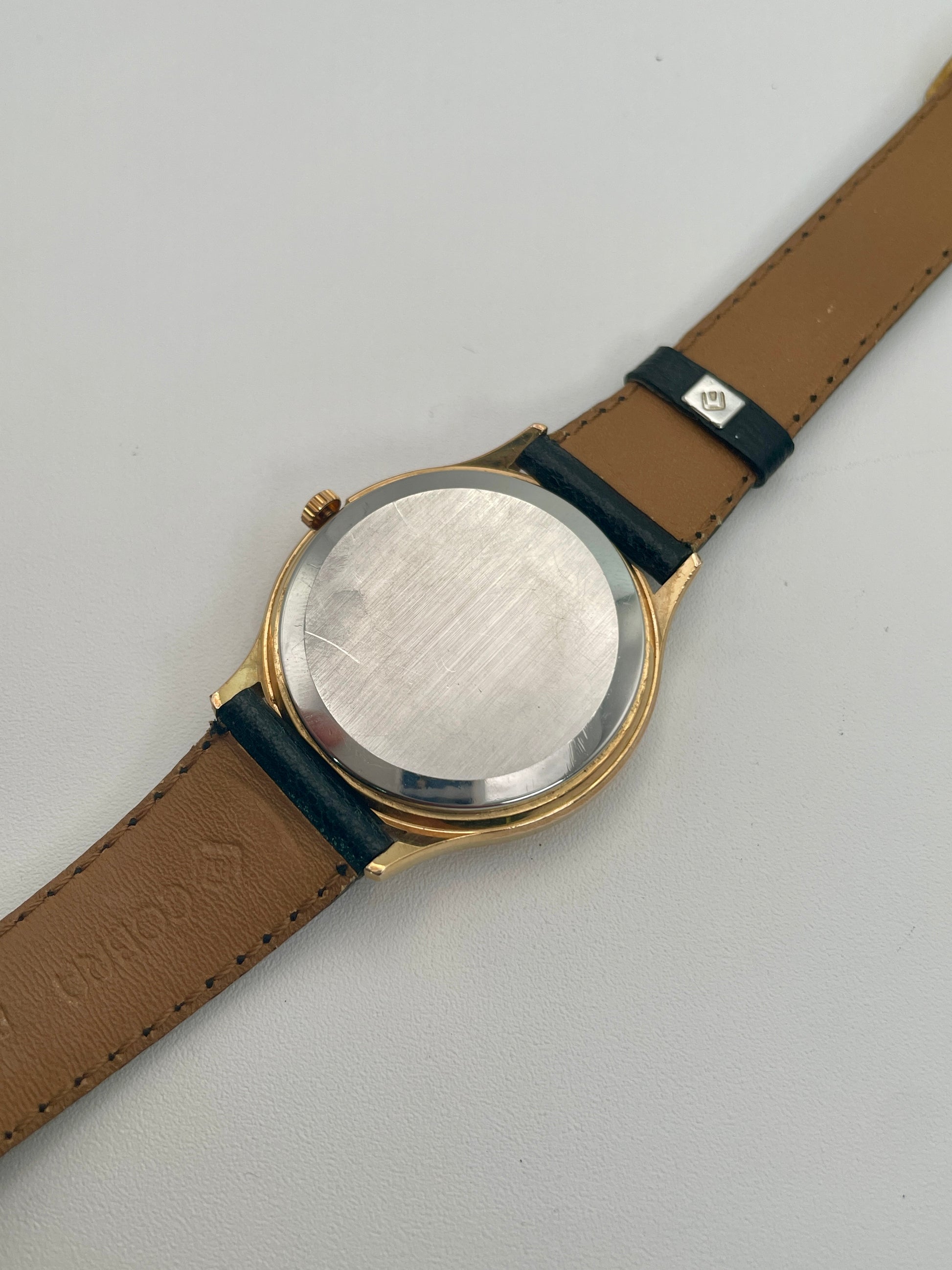 Caseback view of the Omega De Ville 192.0033 showing the stainless steel back
