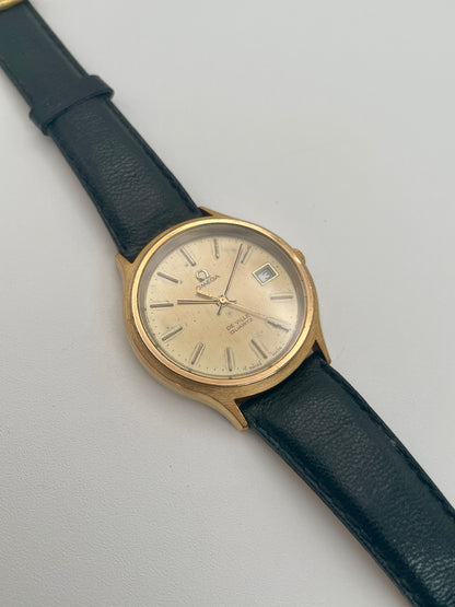 Omega De Ville 192.0033 vintage watch in gold with black strap, main view
