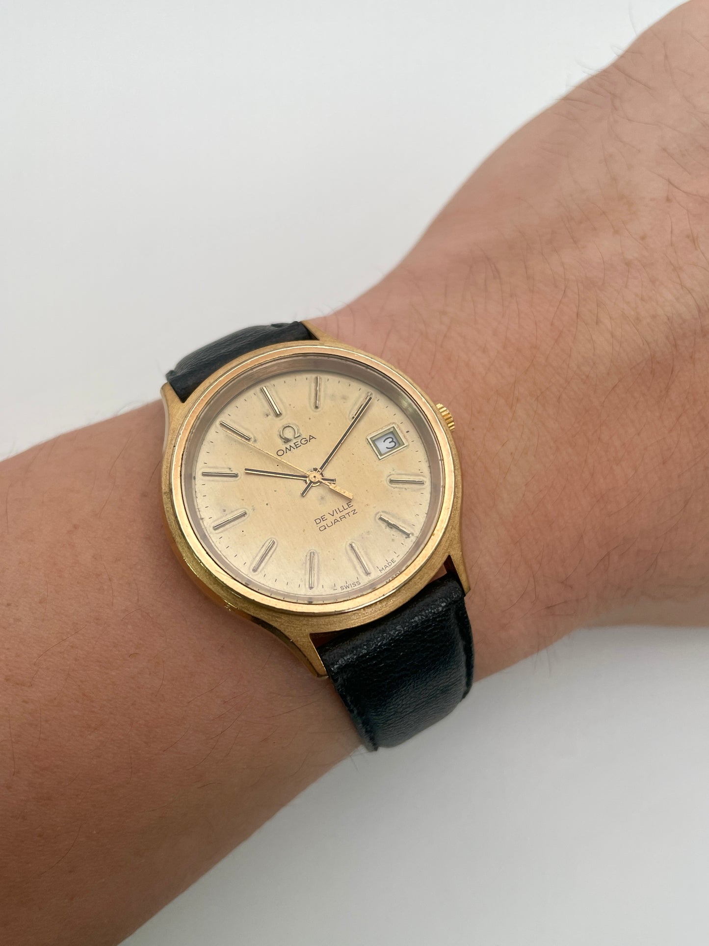 Wrist shot of the Omega De Ville 192.0033 gold watch showing its elegant fit and vintage appeal

