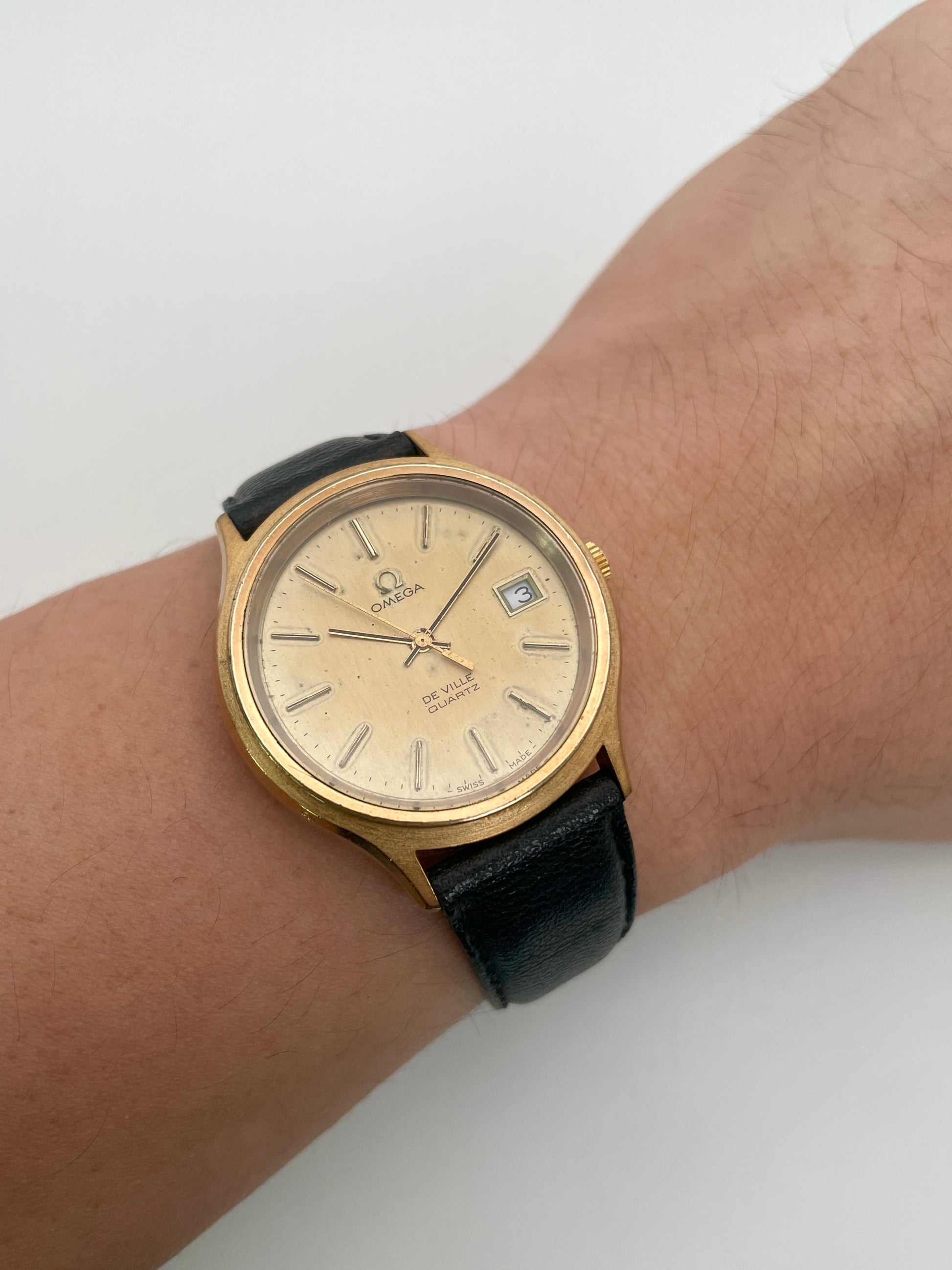 Wrist shot of the Omega De Ville 192.0033 gold watch showing its elegant fit and vintage appeal

