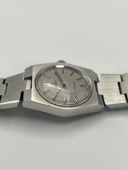 Side profile of Omega Geneve 535.0028 showcasing the stainless steel case.