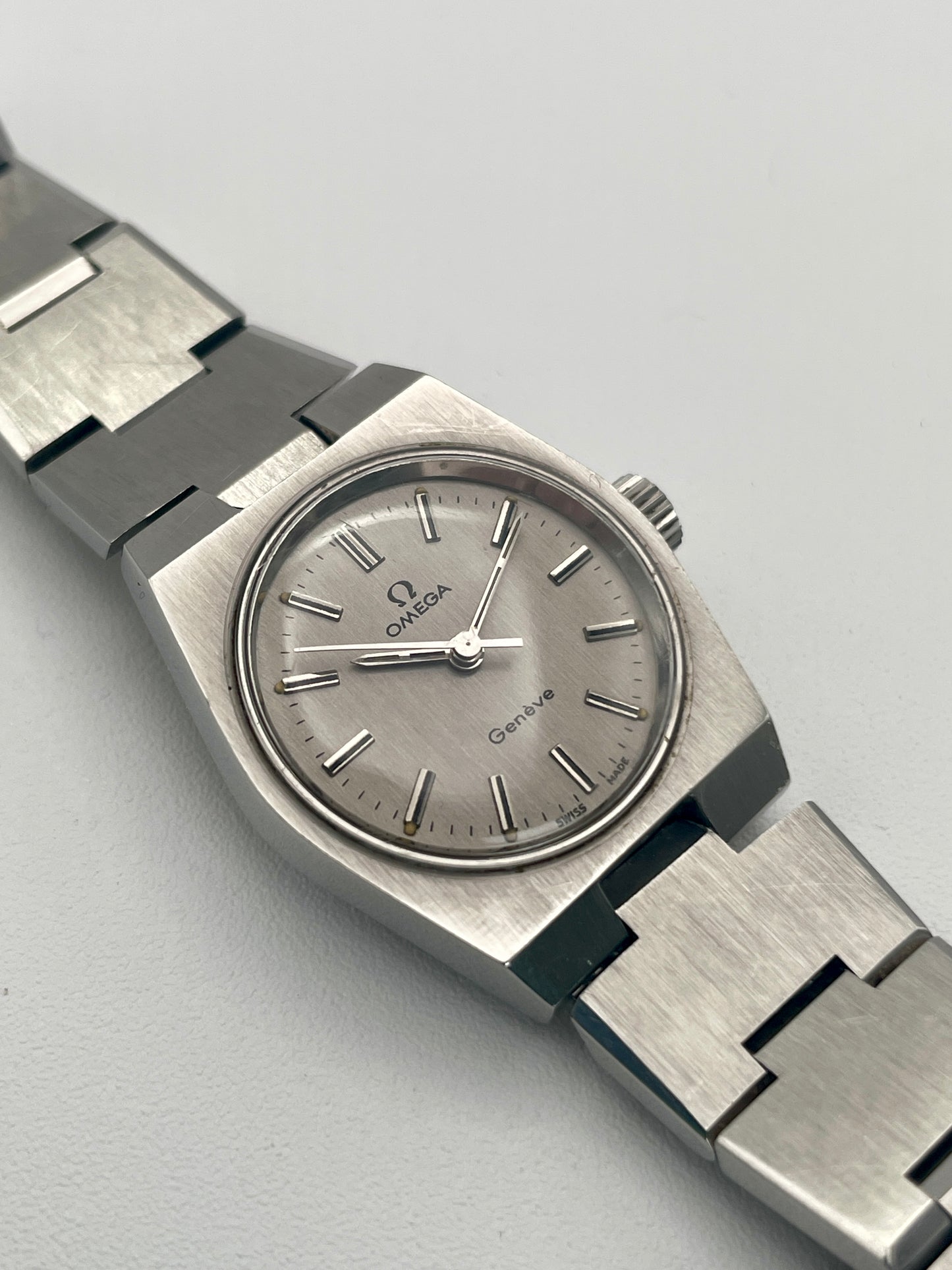 View of Omega Geneve 535.0028, highlighting the sleek brushed steel case and minimalist dial design.