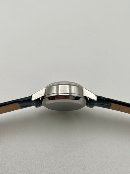 Side profile of the Omega Ladymatic Vintage Women's Watch in Steel, showing its slim design and polished finish.