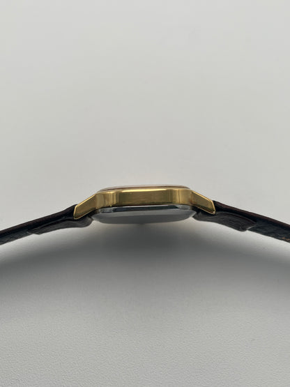 Side view of the Omega De Ville 511.0509 watch, showing the thin profile.