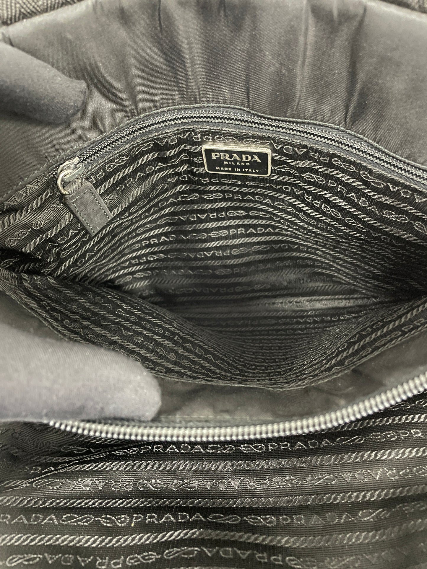 Full interior view of the Prada Tessuto Tote Bag in black nylon, showcasing the spacious compartment and branded lining.