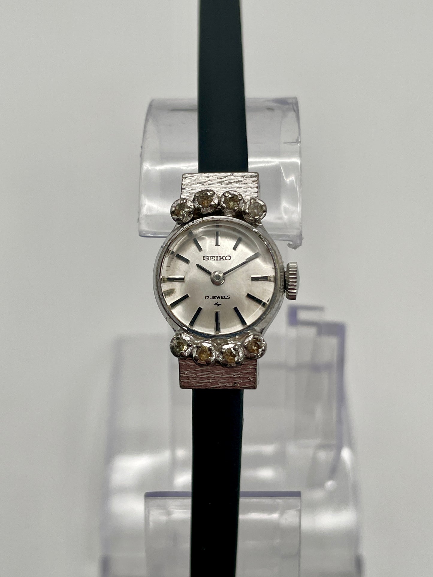 Seiko 10-0900 Vintage Women's Watch in steel with crystal accents, front shot on stand