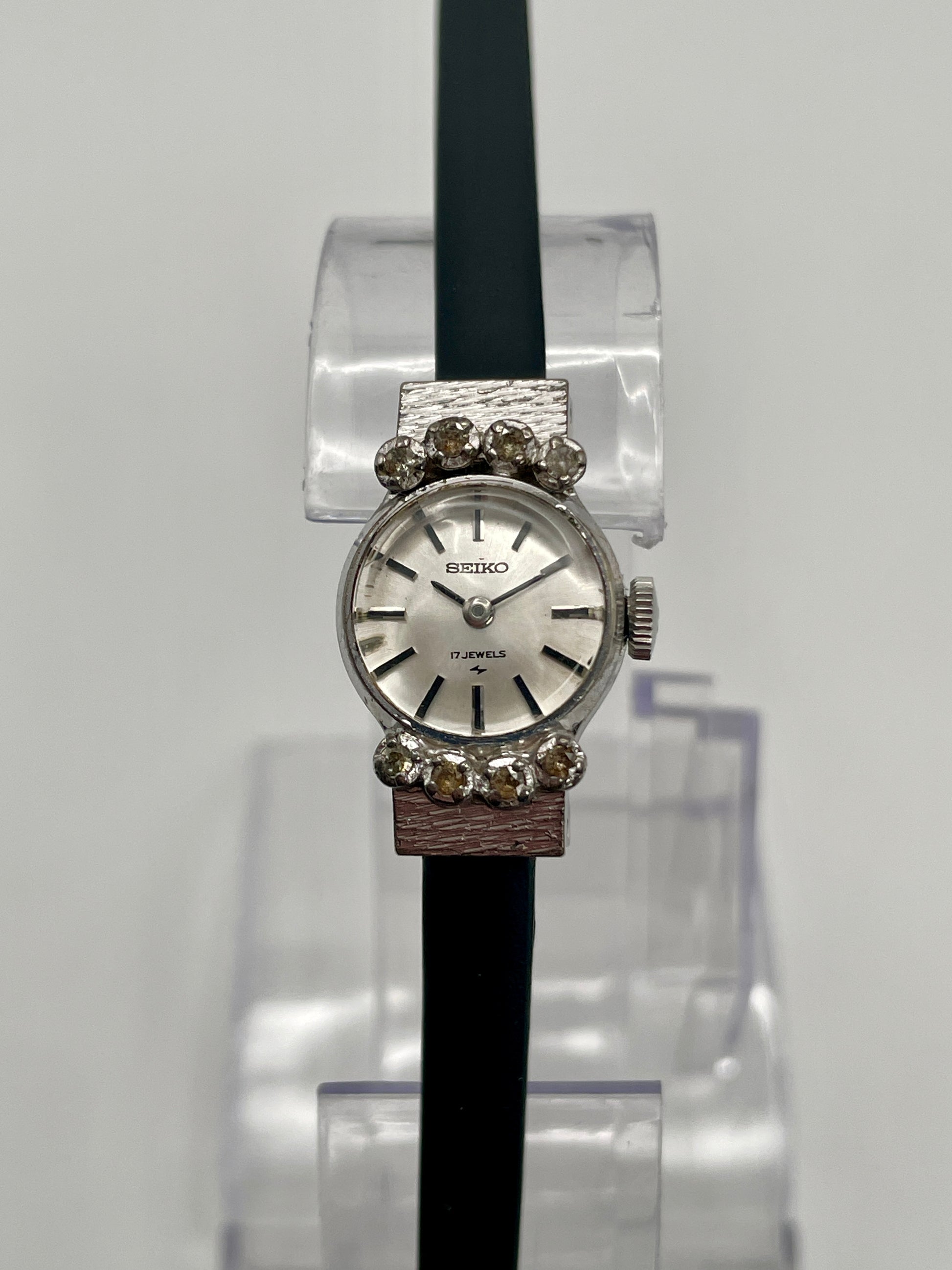 Seiko 10-0900 Vintage Women's Watch in steel with crystal accents, front shot on stand