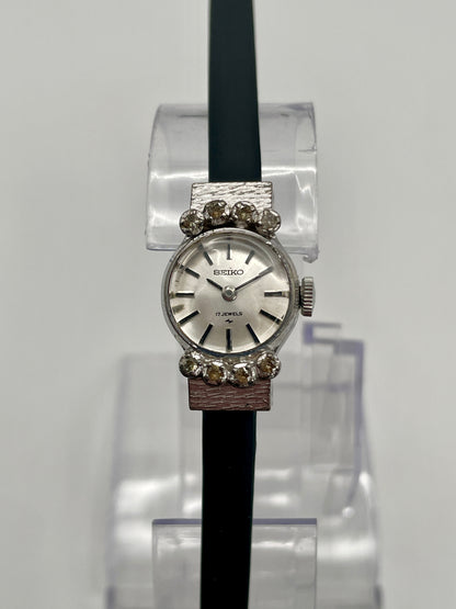 Seiko 10-0900 Vintage Women's Watch in steel with crystal accents, front shot on stand