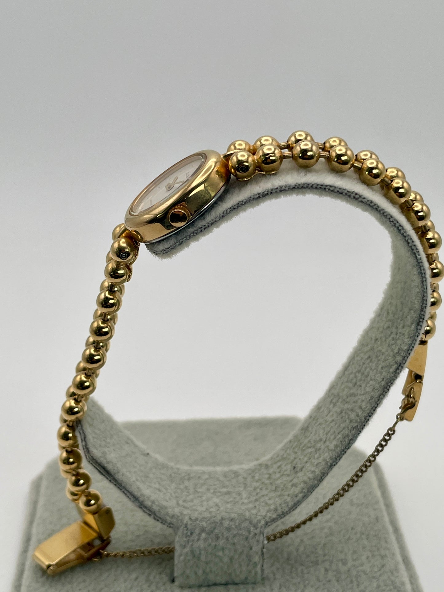 Top view showing Seiko Alba Y588-5180 crown design and bracelet clasp structure.