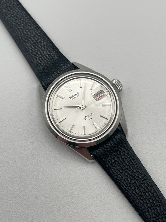 Seiko Chorus vintage watch with silver dial and black leather strap, main view.