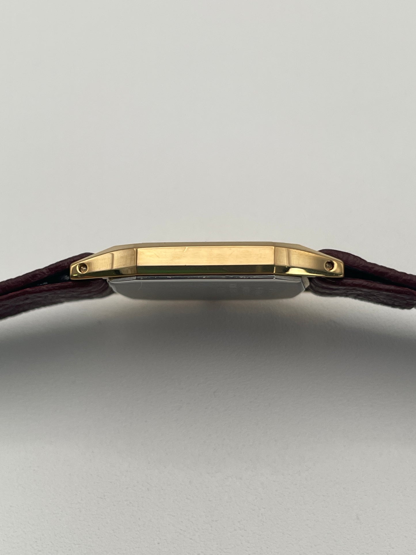 Side profile of the Seiko Exceline Decagon Watch highlighting the thin gold case.