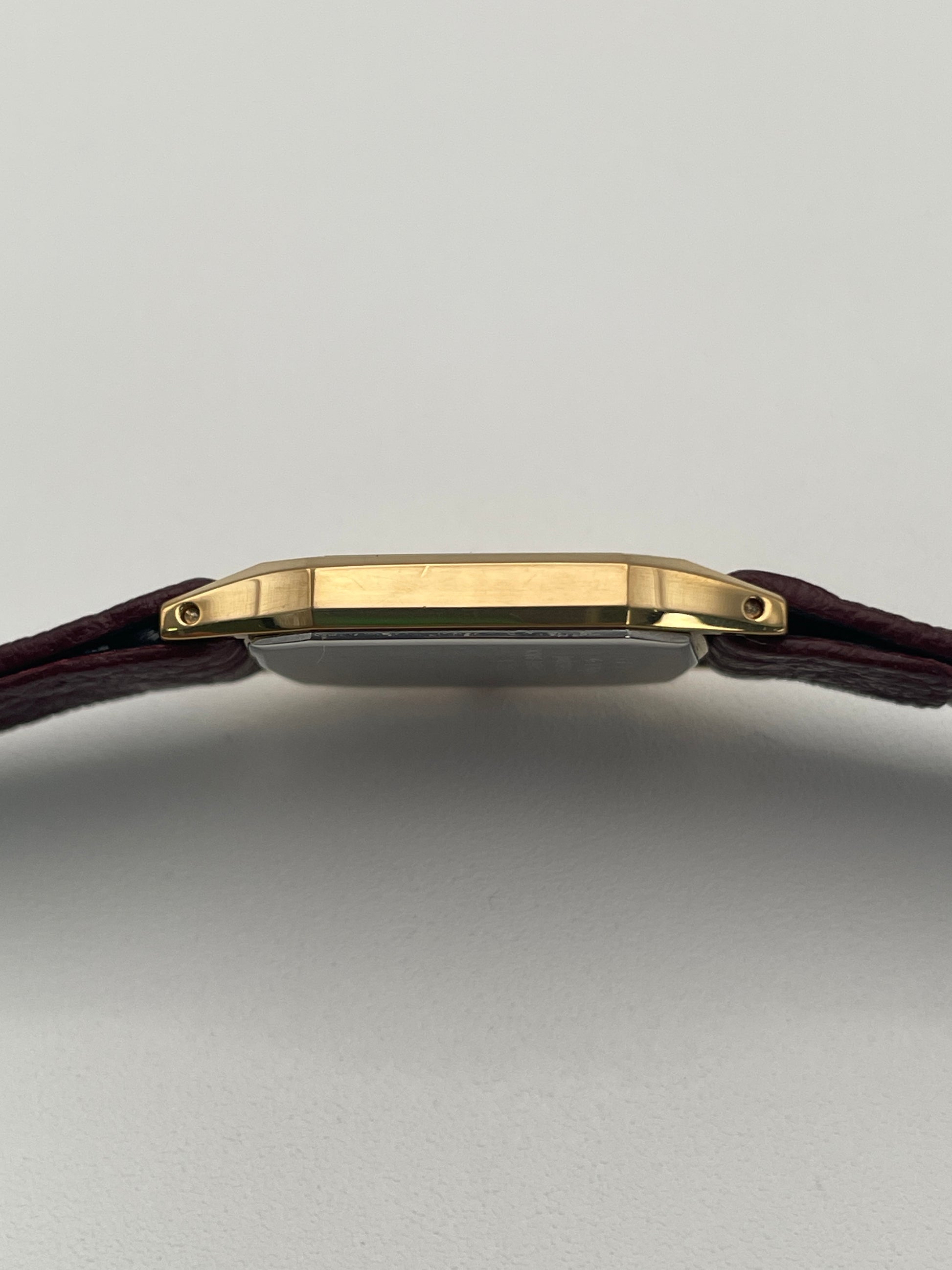 Side profile of the Seiko Exceline Decagon Watch highlighting the thin gold case.