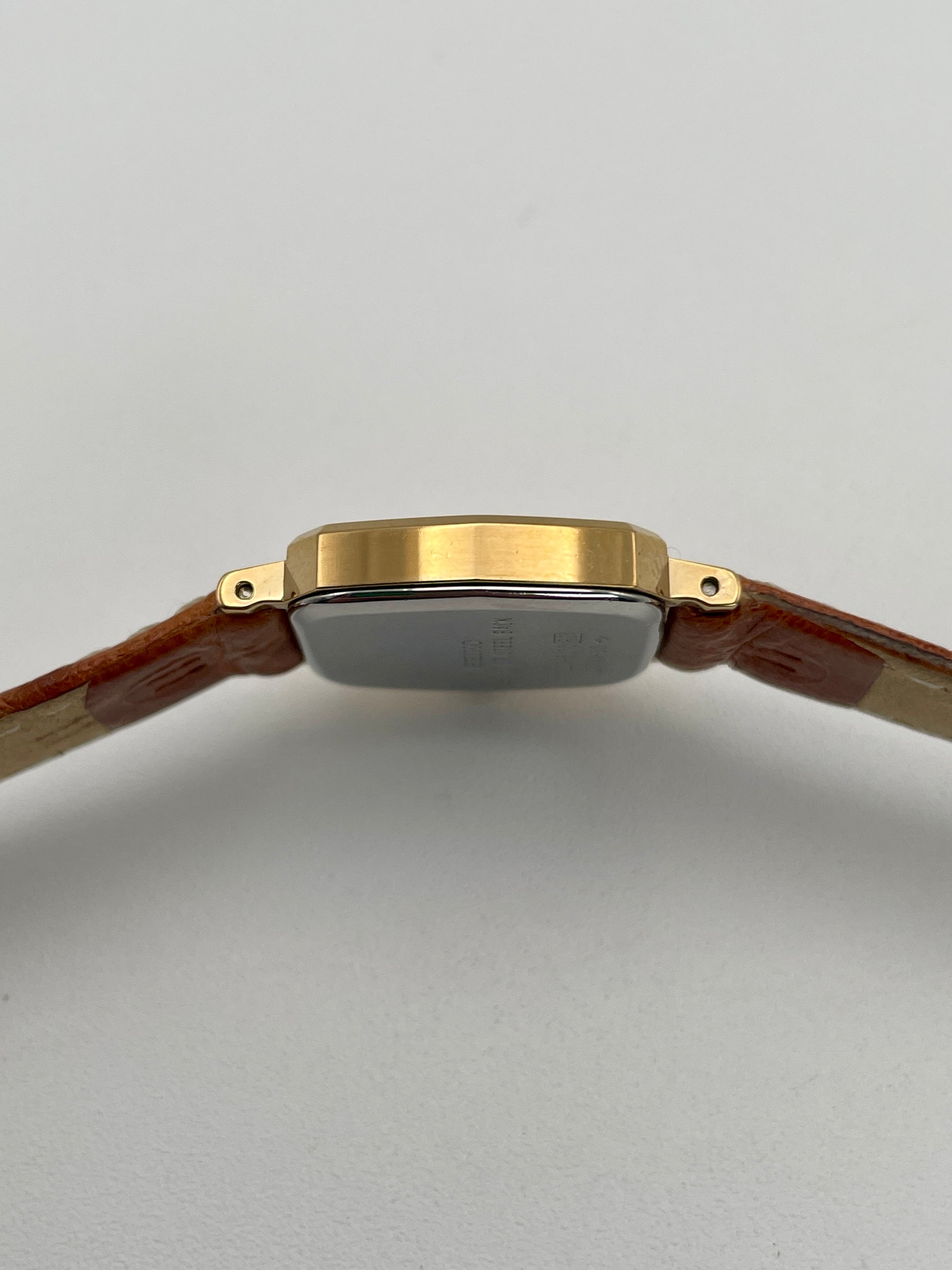 Side view of the Seiko Exceline vintage watch in gold, showing the thickness and profile of the octagonal case.