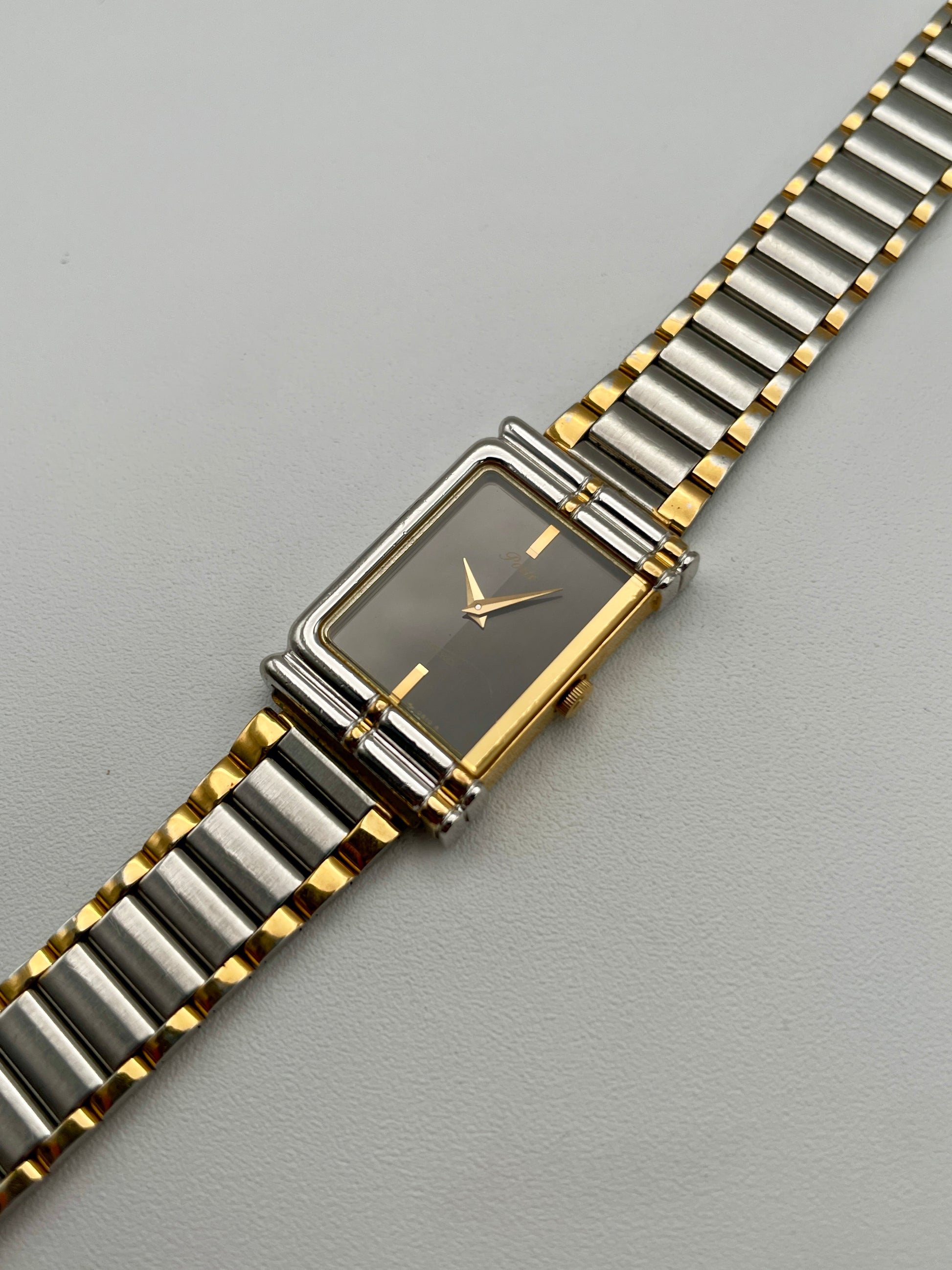 Angled shot showcasing the black dial and elegant rectangular case of the Seiko Porte vintage watch
