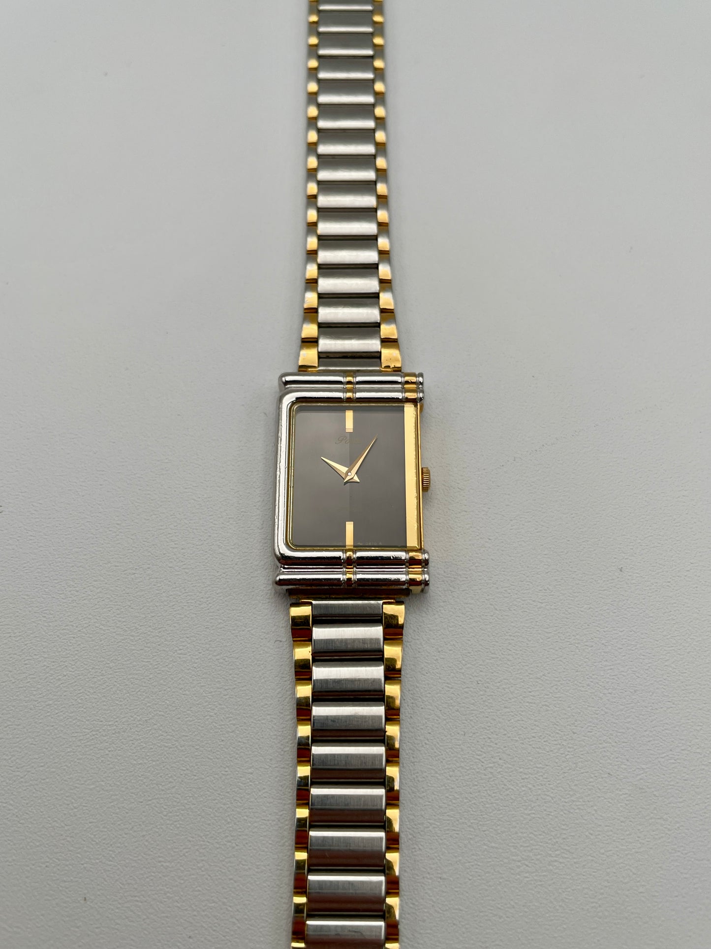Front view of the Seiko Porte 2P20-5400 Vintage Women's Watch in a two-tone rectangular case with black dial and bracelet

