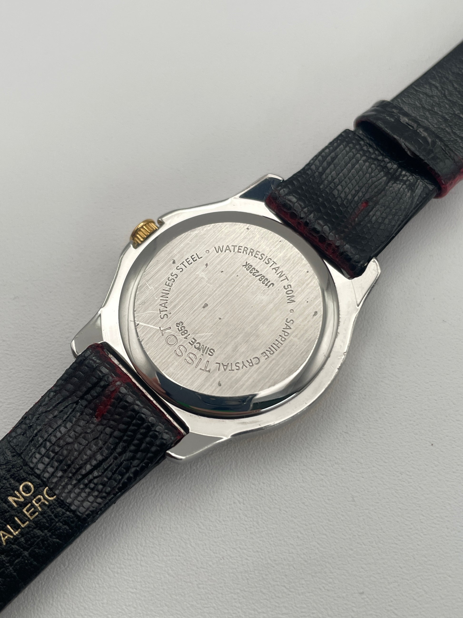 Caseback of Tissot PR50 vintage watch showing stainless steel construction.