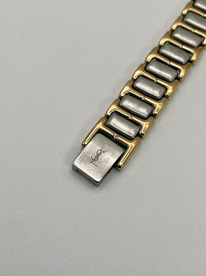 Clasp view of the YSL Black Pour Femme watch showing the YSL logo engraved on the buckle.