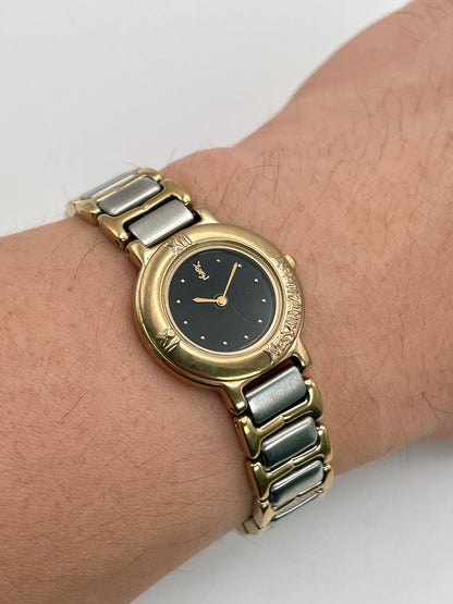 Wrist shot of the YSL Black Pour Femme vintage watch worn to show its size and fit.