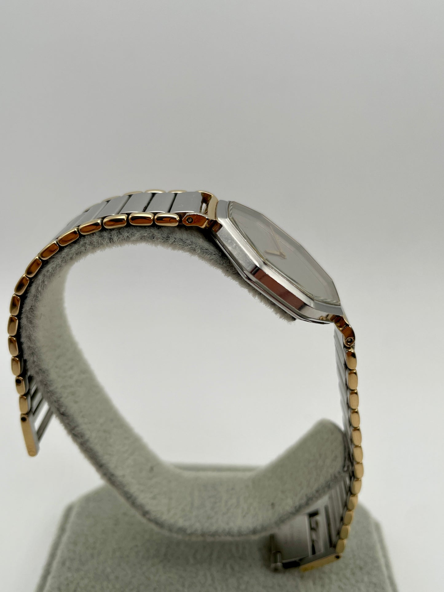 Side view of the YSL octagon case showing the profile and slim lugs
