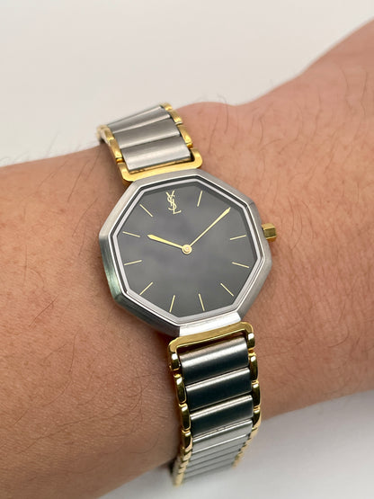 Wrist shot of the Yves Saint Laurent Octagon Vintage Women's Watch highlighting its comfortable fit and stylish design.